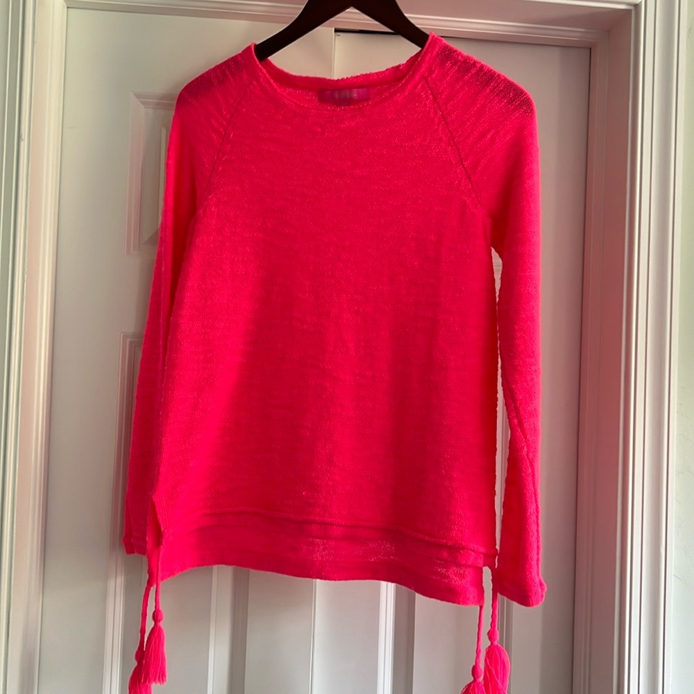 Lilly Pulitzer pink beach sweater.